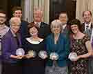 Four award winners receive their trophies (front row from left to right) Professor Judy Harris, Adrienne Mason, Dr Alison Blaxter and Zoë Pither